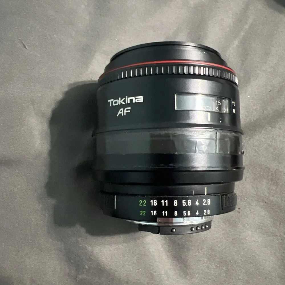 Tokina AF lens 28-70mm 1:2.8-4.5 Macro 70 Japan 9105500